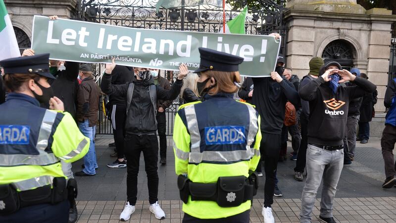 Gardaí at the protest outside Leinster House. Photograph: Dara Mac Dónaill/The Irish Times