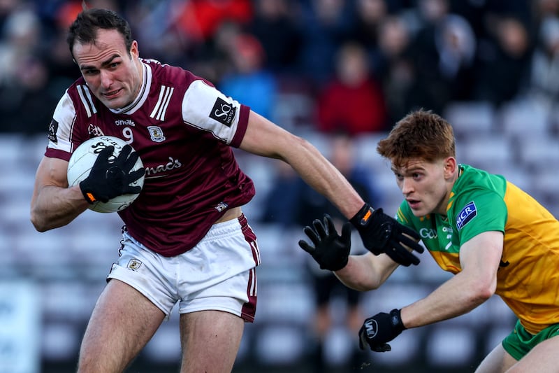 Galway’s John Maher gets a break on Ciarán Moore of Donegal. Photograph: Ben Brady/Inpho