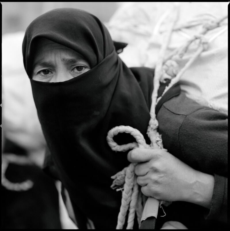 A woman waiting at the Barrio Chino border crossing in Melilla.