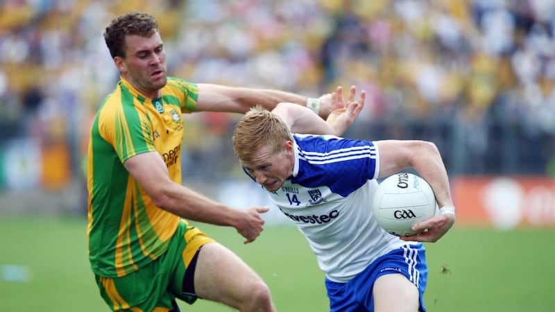 Donegal’s Eamonn McGee with Monaghan’s Kieran Hughes at Clones. Photograph: William Cherry/Inpho/Presseye