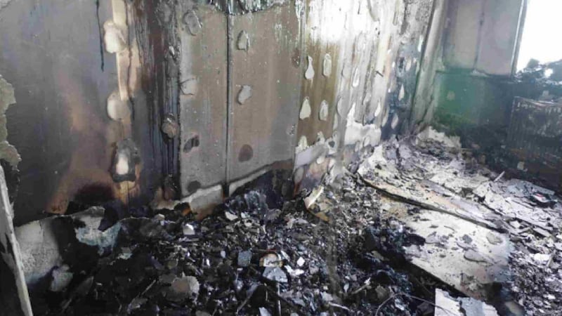 Fire damage in the second bedroom of flat 16 following the blaze at the Grenfell Tower block.