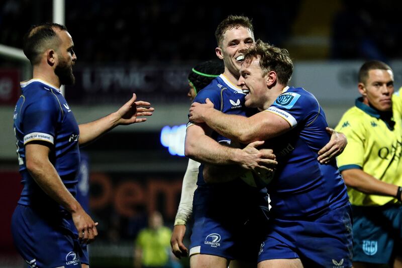 Leinster’s Liam Turner celebrates scoring their seventh try with Rob Russell and Jamison Gibson-Park. Photograph: Ben Brady/Inpho