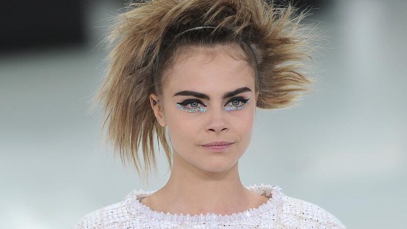 Cara Delevingne walks the runway during the Chanel show as part of Paris Fashion Week. Photograph: Pascal Le Segretain/Getty Images