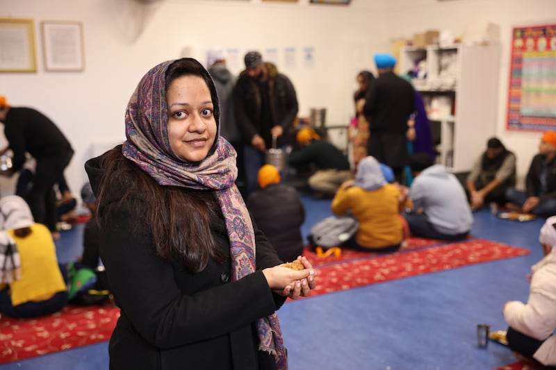 Indian food writer Vritti Bansal holds an edible blessing called kara krasad. Photograph: Dara Mac Dónaill


