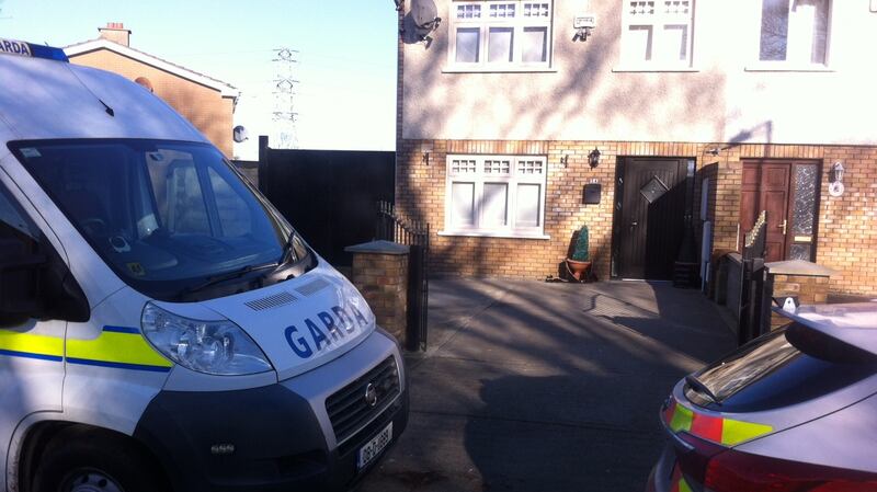 Gardaí search the home of Kenneth O’Brien (33) in Clondalkin, west Dublin on Wednesday. Photograph: Mark Hillard