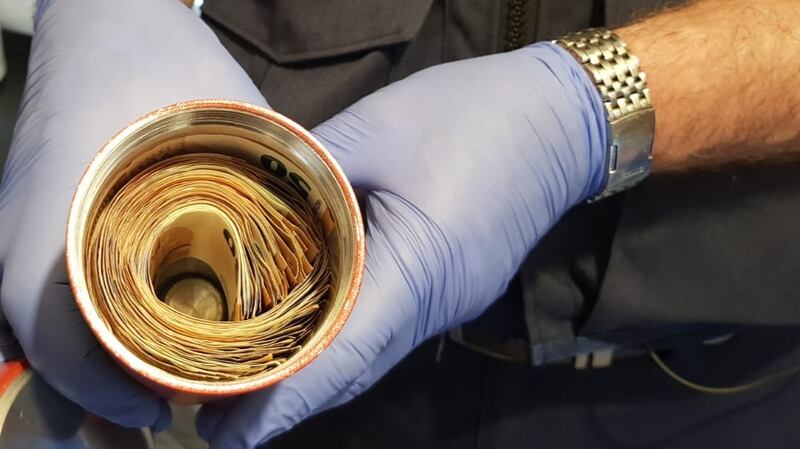 An estimated €5,000 in cash was seized during the raid. Photograph: Garda Press Office