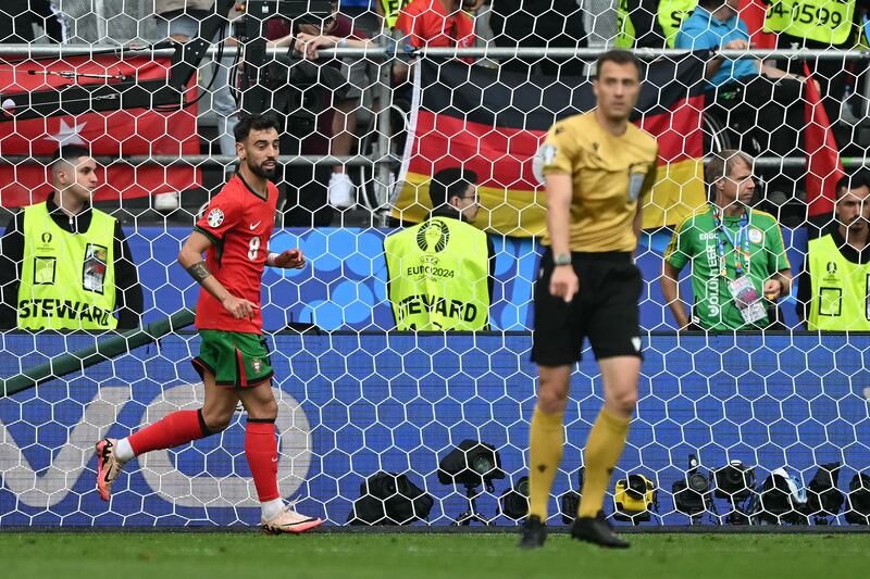 Bruno Fernandes celebrates after scoring his team's third goal during the match between Turkey and Portugal at the BVB Stadion in Dortmund. Photograph: Ozan Kose/AFP via Getty Images