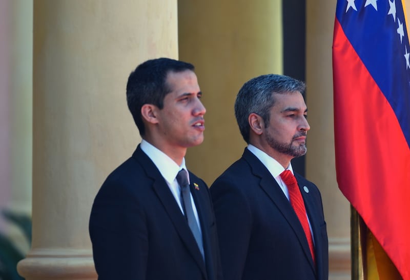 Paraguay’s president Mario Abdo Benitez (right) is pictured Venezuelan opposition leader and self-declared acting president Juan Guaido at the presidential palace on Friday. Photograph: Norberto Duarte/AFP/Getty