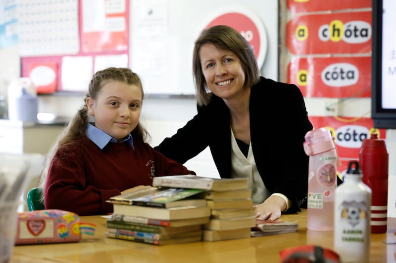 Teacher and school leader Jane O'Toole at Scoil Chrónáin with 10-year-old Caitlyn Malone. Photograph Nick Bradshaw 