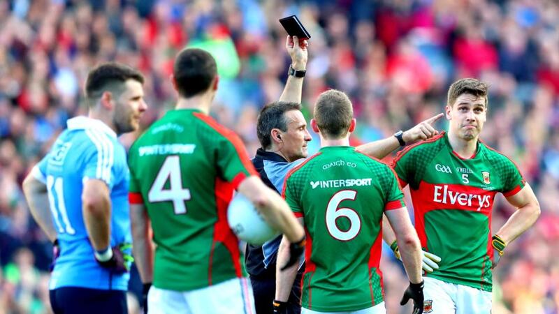 Referee Maurice Deegan black cards Lee Keegan. Photo: James Crombie/Inpho