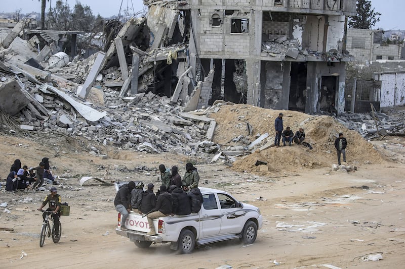 Hamas security forces on patrol near destroyed buildings in Rafah, southern Gaza, on Wednesday. Photograph: Mohammed Saber/EPA-EFE