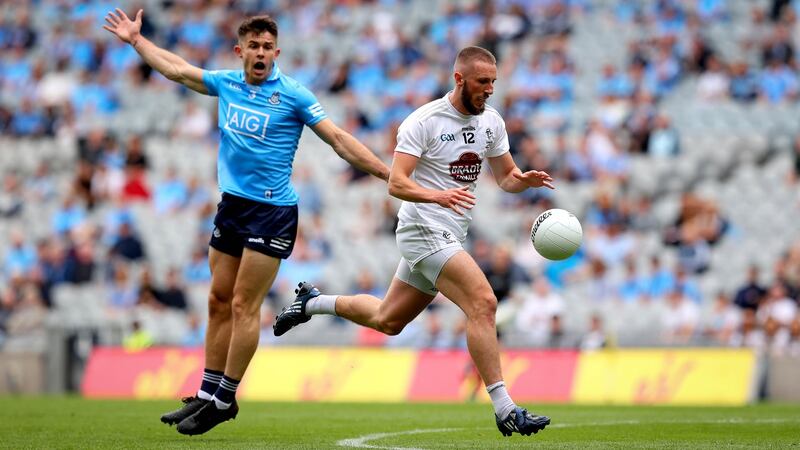 Dublin’s David Byrne in action against Neil Flynn of Kildare during the Leinster SFC Final at Croke Park. Photograph: Ryan Byrne/Inpho