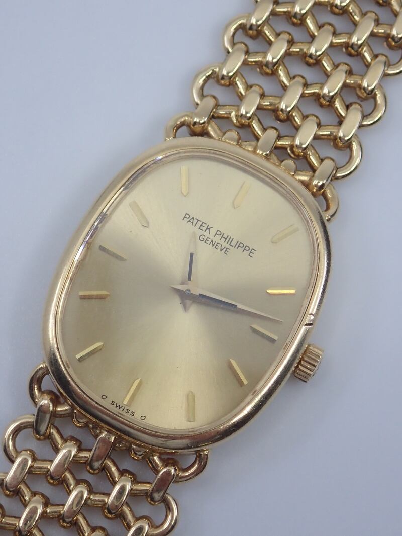 An 18ct gold Patek Philippe gondolo wrist watch from €5,000-€9,000. 