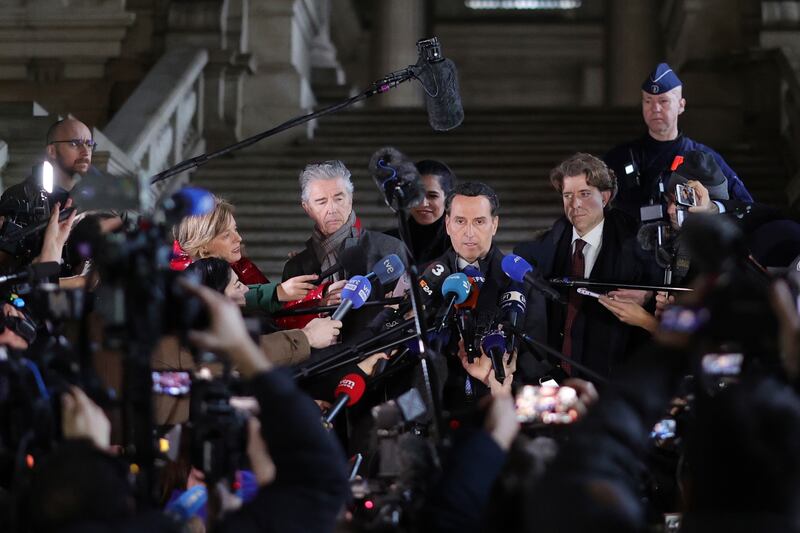 Lawyers for Eva Kaili speak to the media at a court in Brussels. Photograph: Olivier Matthys/AP/PA)