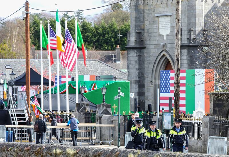 Gardaí walk outside St Muredach's Cathedral in Ballina before Mr Biden's speech. Photograph: Paul Faith/AFP/Getty Images