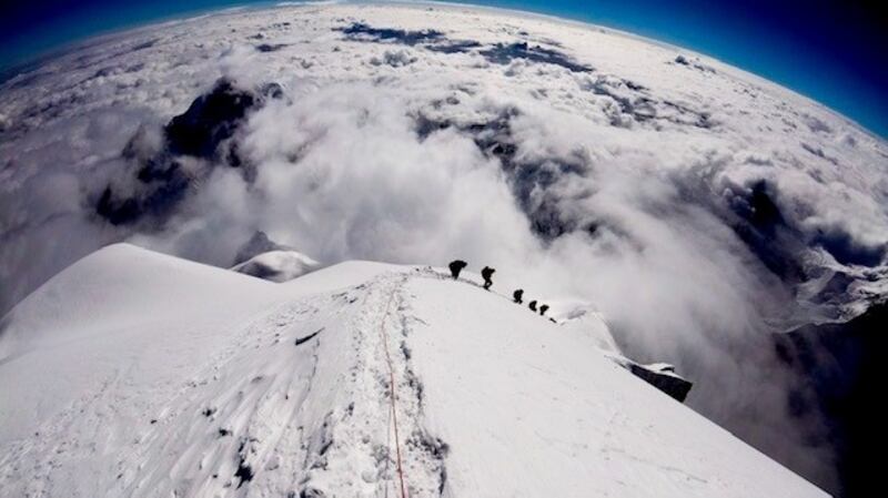 Standing on the summit of the greatest mountain in the world, K2.