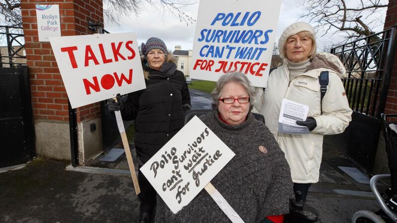 Marie McGuike, Maureen McGovern and Anne Shanahan, members of Justice for Polio Survivors,  protesting at the Rehab premises in Sandymount. Photograph:  Andres Poveda