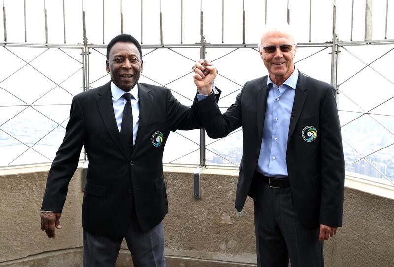 Pelé and Franz Beckenbauer pose at the Empire State Building in April 2015. Photograph: Timothy A Clary/AFP via Getty Images