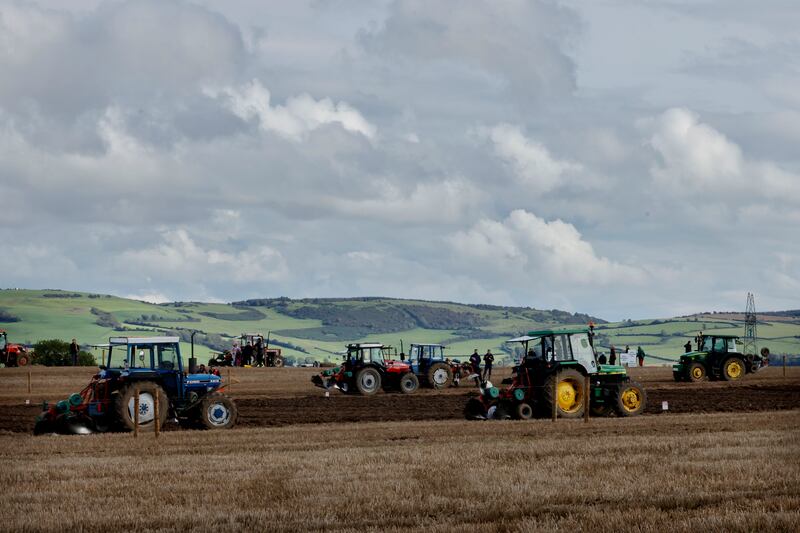 Tractors cross the landscape during ploughing competitions on Wednesday. Photograph: Alan Betson/The Irish Times