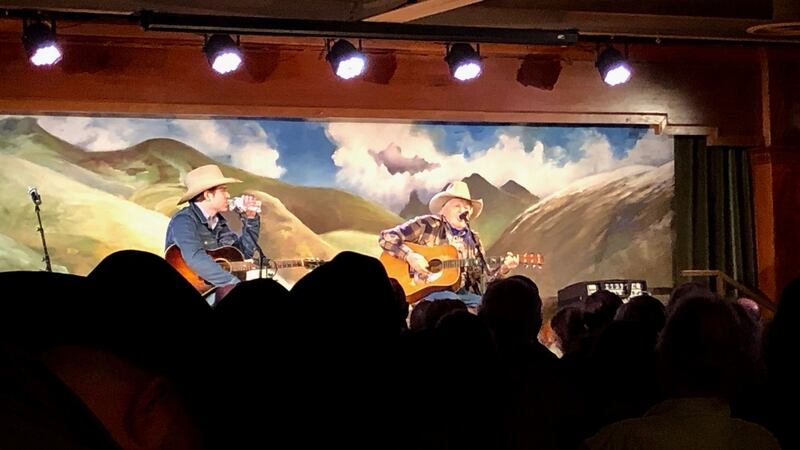 Rambling Jack Elliott (right) onstage in Elko, Nevada