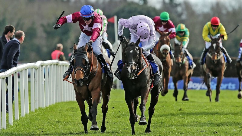 Ger Fox on Rogue Angel wins the Boylesports Irish Grand National just ahead of Ruby Walsh on Bless the Wings. Photo: Morgan Treacy/Inpho