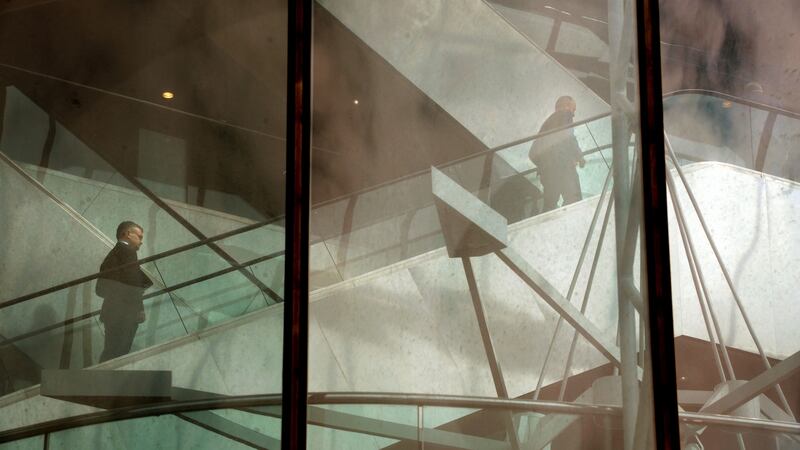 Taoiseach Micheál Martin  arriving at the Convention Centre followed  by newly appointed Minister for Agriculture Dara Calleary: On Thursday, the Taoiseach escaped to Belfast. Photograph: Dara Mac Dónaill