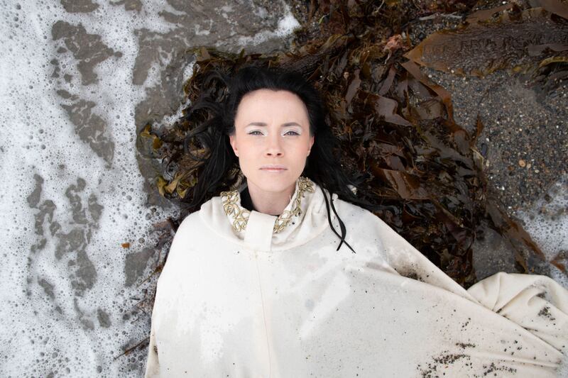 Actor Ellen Whitehead performs a scene from Tír na nÓg on Killiney beach. The major new musical, written by Shauna Carrick, will take place at the Mill Theatre Dundrum from the 11th to the 19th of June.