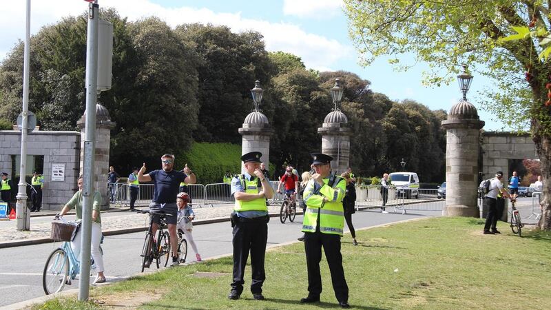 Gardaí at the Park Gate Street entrance to  Dublin’s Phoenix Park on Saturday. Photograph: Ronan McGreevy