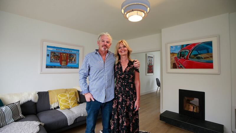 Kevin and Kathrin Houlihan kept the raised hearth, very much a child of the 1960s, and had it tiled in a stone-like fire-retardant tile at their renovated house at Lakelands, Stillorgan. Photograph: Nick Bradshaw