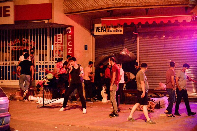 Men smash up shops and homes in Ankara believed to be owned by Syrian families during unrest, which broke out in response to a fight between locals and migrants in which one Turkish national was fatally stabbed. Such disturbances have become commonplace. Photograph: STR/AFP via Getty Images