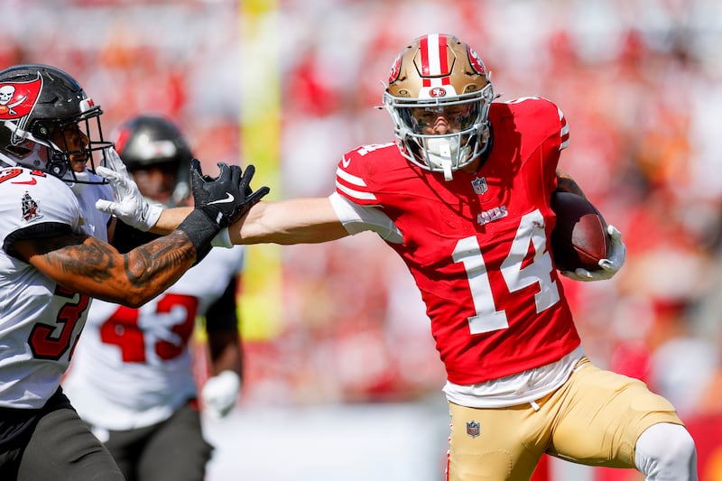 Ricky Pearsall of the San Francisco 49ers runs with the ball for a touchdown during the first quarter against the Tampa Bay Buccaneers. Photograph: Mike Ehrmann/Getty Images