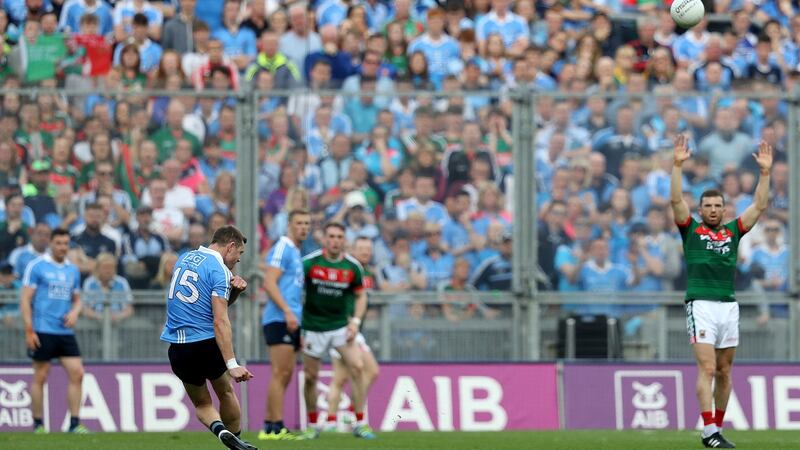 Dublin’s Dean Rock kicks a free at the end of the first half. Photograph: Tommy Dickson/Inpho