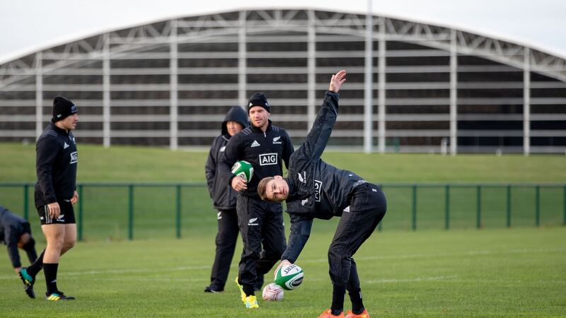 Beauden Barrett stretches during training. Photo: Morgan Treacy/Inpho