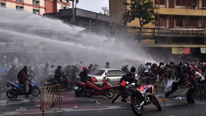 Police fire water cannon at pro-democracy protesters  in Bangkok on Tuesday. Photograph:  Lillian Suwanrumpha/AFP via Getty Images