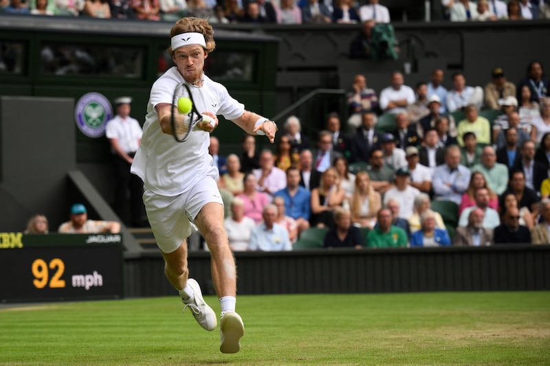 Russia's Andrey Rublev returns the ball to Serbia's Novak Djokovic during their men's singles quarter-final at Wimbledon. Photograph: Daniel Leal/AFP via Getty Images