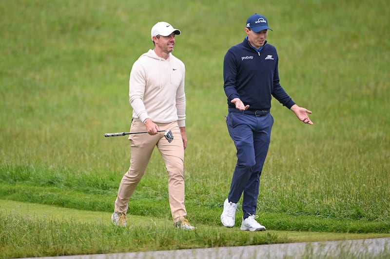 Rory McIlroy and Matthew Fitzpatrick walk across the 14th hole during a practice round prior to the US PGA Championship at Valhalla Golf Club in Louisville, Kentucky. Photograph: Ross Kinnaird/Getty Images