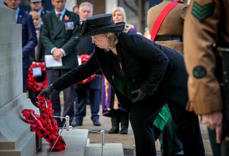 Secretary of State for Northern Ireland Karen Bradley lays a wreath at the Remembrance Service at Belfast City Hall on the 100th anniversary of the signing of the Armistice which marked the end of the First World War Photograph: Matt Mackey/Press Eye/PA Wire