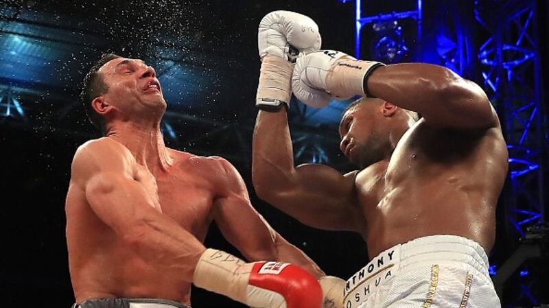 Anthony Joshua uppercuts Wladimir Klitschko during his heavyweight title win at Wembley. Photograph: Richard Heathcote/Getty