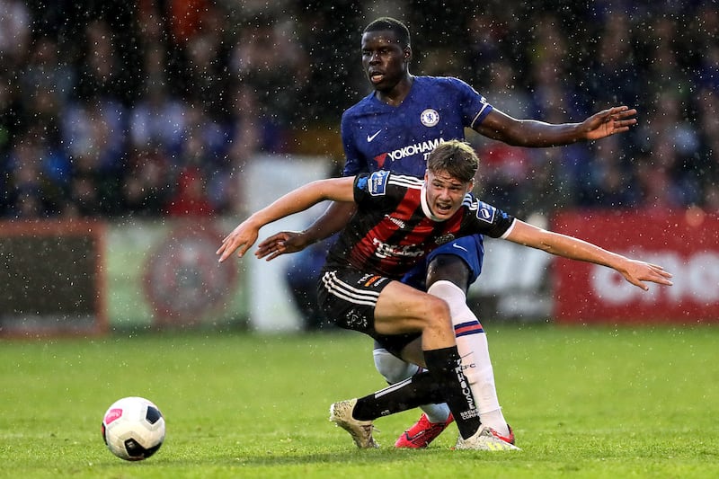 Bohemians' Evan Ferguson, just 14, in action against Kurt Zouma of Chelsea at Dalymount Park in 2019. Photograph: Laszo Geczo/Inpho 
