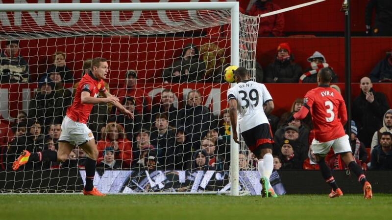 Darren Bent of Fulham scores his team’s second in injury time  at Old Trafford. Photograph: Michael Regan/Getty Images