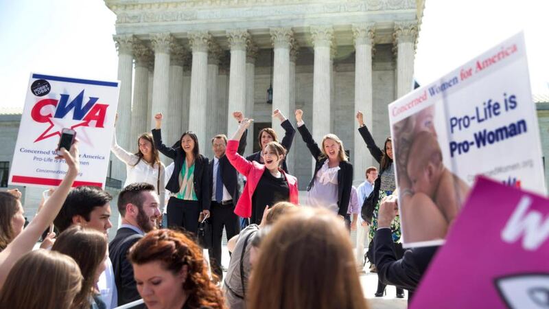 Hobby Lobby’s legal team celebrate outside the Supreme Court in Washington after the  ruling.  Photograph: Doug Mills/The New York Times