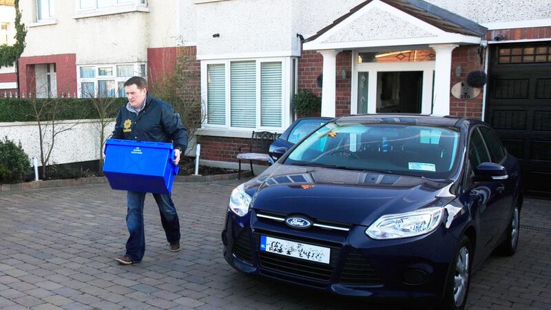 Jonathan Dowdall’s house on the Navan Road in North Dublin being  searched by members of the Special Detective Unit. Photograph: Gareth Chaney/ Collins