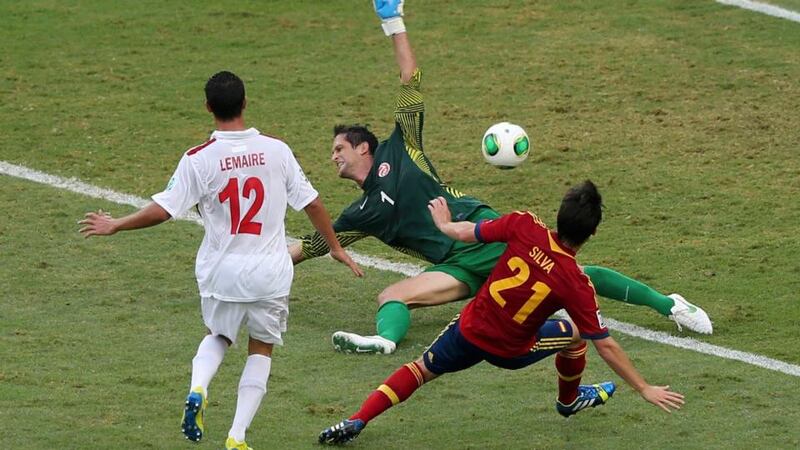 Tahiti’s goalkeeper Mikael Roche is beaten by  Spain’s David Silva at the Estadio Maracana in Rio de Janeiro. Photograph: Satiro Sodre/Reuters