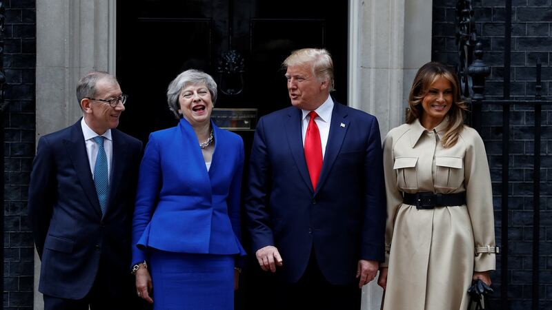 US President Donald Trump and First Lady Melania Trump meet Britain’s Prime Minister Theresa May and her husband Philip at Downing Street. Photograph: Peter Nicholls/Reuters