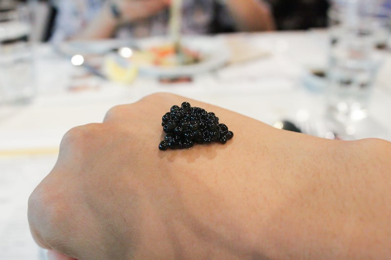 The caviar will warm on the back of your hand. Photograph: iStock