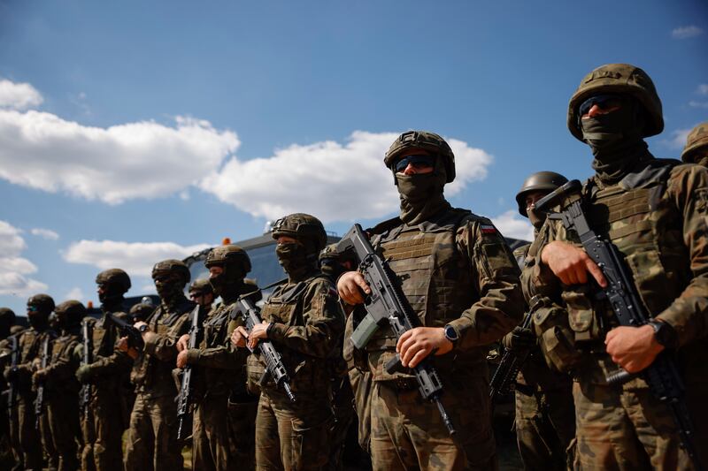 Polish troops recently deployed close to the Belarus border. Photograph: Michal Dyjuk/AP