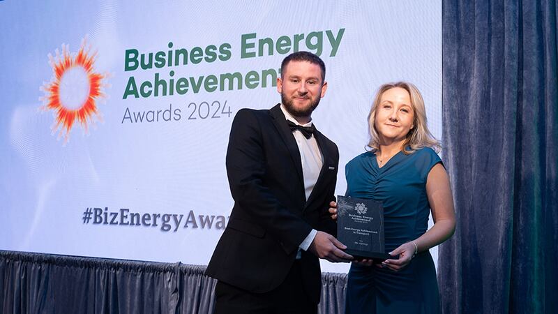 Adam Kane, community lead at Business River, presents the best energy achievement in transport award to Violet Devereux, PRL 