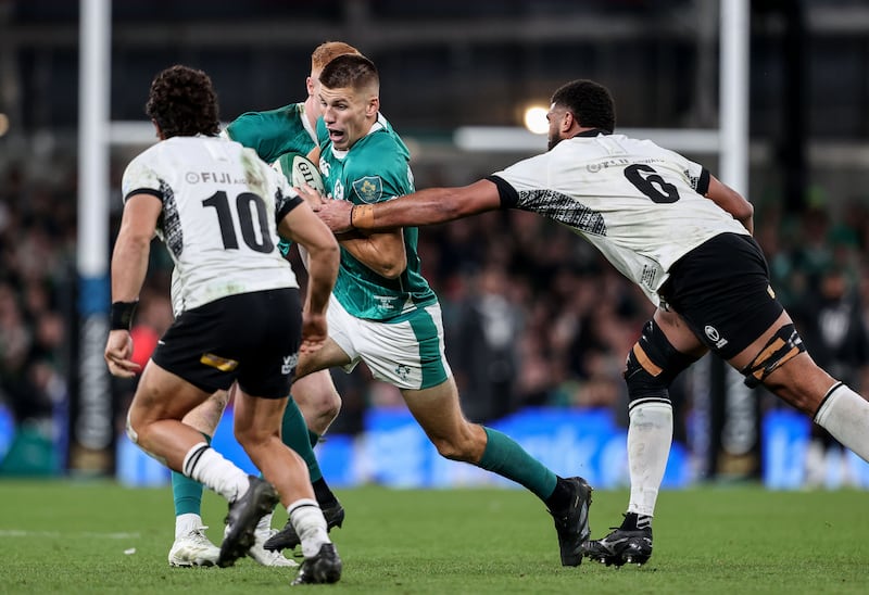 Sam Prendergast in action against Fiji's Meli Derenalagi. Photograph: Dan Sheridan/Inpho