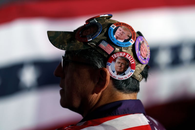 A supporter waits for Donald Trump at a rally in Reading, Pennsylvania. Photograph: Will Oliver/EPA