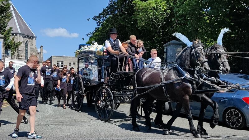 The funeral cortege for Dean Maguire makes its way to Newlands Cemetery. Photograph: Collins